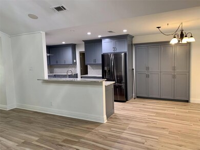 Living room opens into Kitchen.