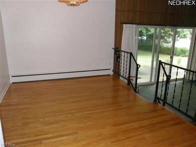 Entertain in style in this dining room with hardwo