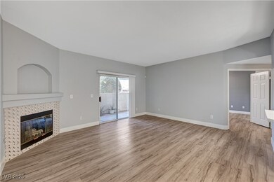 Unfurnished living room featuring light wood-style