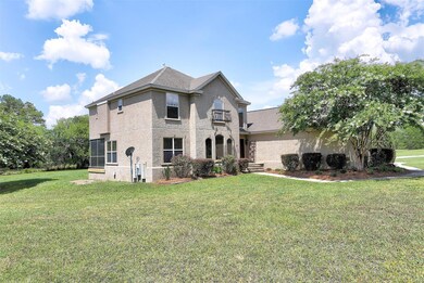 The home is situated on 5 tranquil acres.