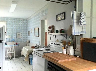 Enter the kitchen from the dining...