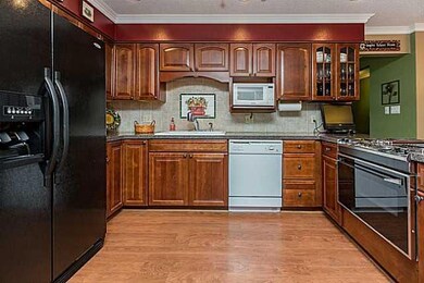 Kitchen. Check out the fancy wine cabinet.