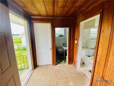This entry with a half-bath is the perfect canvas