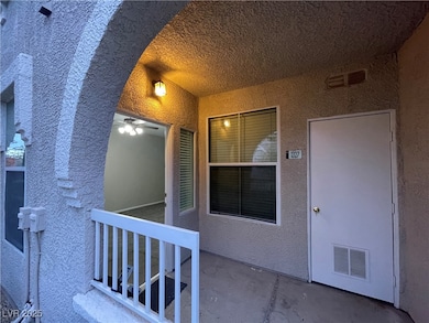 View of exterior entry featuring stucco siding