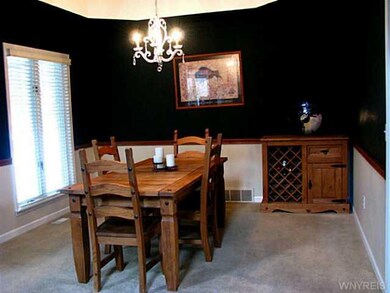 Dining Room. The formal dining room sits off the k