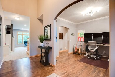 Beautifully finished wood floors in the formal din