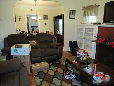 Living room open to dining room
