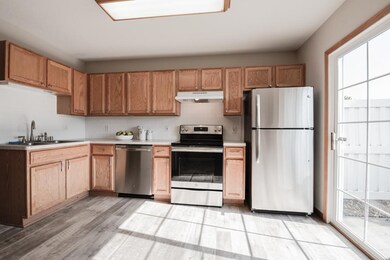 The wonderful eat-in kitchen is equipped with bran