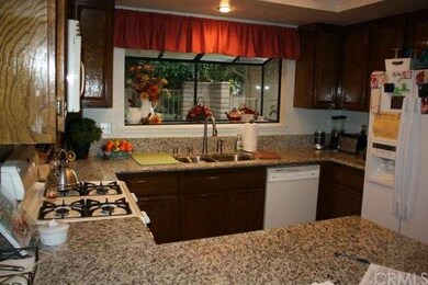 Beautifully updated kitchen with granite counter.