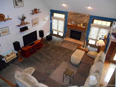Family Room. Family room w/gas fireplace and cathe