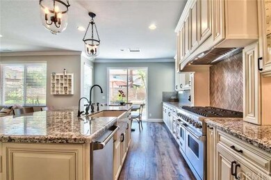 View from Butler Pantry into the Kitchen showing U