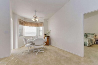 Dining Area w/Bay Windows Opens to Patio