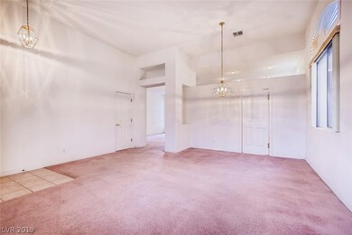 Spacious front living room with ample natural ligh