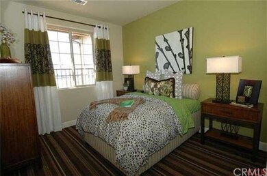 One of the bedrooms located down the hall from the