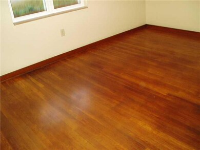 Master Bedroom. All three bedrooms are bright, hav