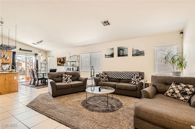 Living room featuring light tile patterned floorin