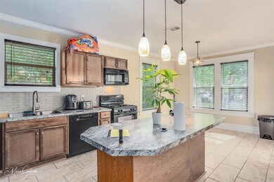 Kitchen with decorative light fixtures, a kitchen 