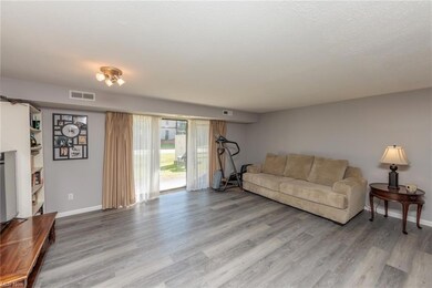 View of hardwood floored living room
