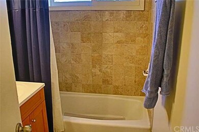 Front four units contain updated baths with design