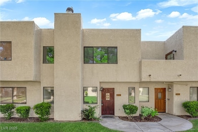 View of front of house featuring stucco siding