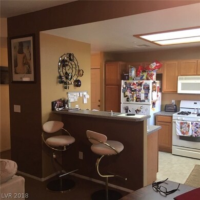 Kitchen breakfast bar from dining area.