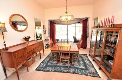 Dining room just off the kitchen with sliding glas