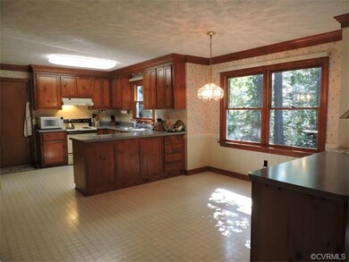 Spacious Eat-in Kitchen includes crown molding.