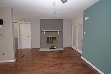 Fireplace and entry to sun room