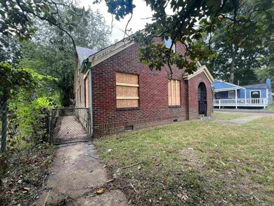 View of home's exterior featuring a lawn