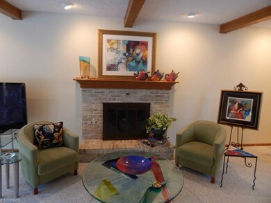 Beautiful sunken Great Room with gas fireplace.