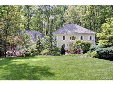 Sited on almost an acre of privacy and gardens in 