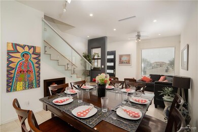 Dining room featuring light tile floors and ceiling fan