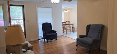 Main living area has new paint and refinshed hardwood floors