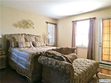 large bright master bath with deck