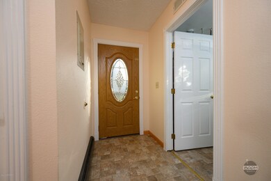 Entryway with new doors throughout