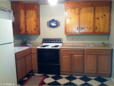 Kitchen - Tile counter tops, tile floor and solid 
