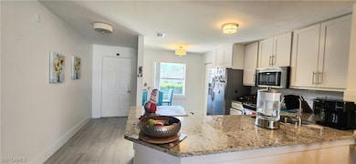 1330 Derbyshire Ct unit 203, Naples, FL 34116 - photo 5