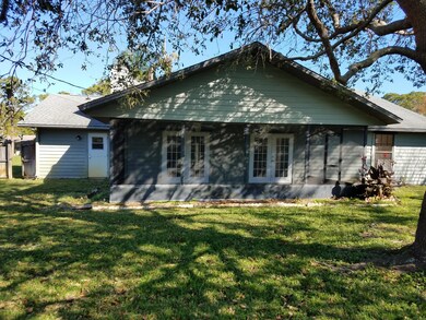 BACK COVERED SCREENED PORCH