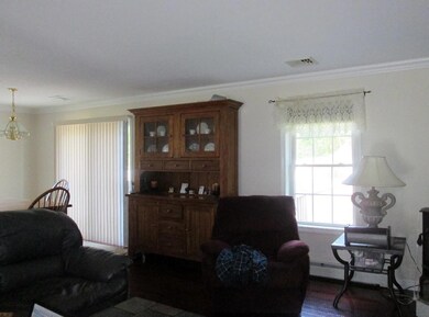 Living room continues the open...