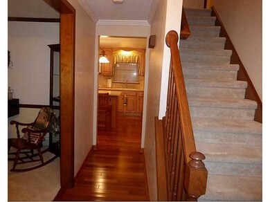 Entry/Foyer. Entry way has crown moulding and glea