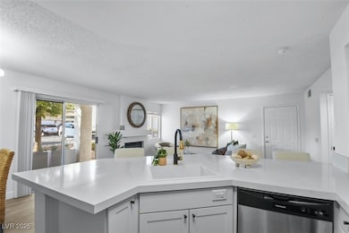 Kitchen featuring a sink, stainless steel dishwash