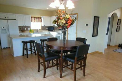 Kitchen. Dining area between kitchen and family ro