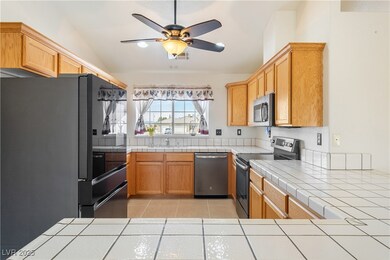 Kitchen with appliances with stainless steel finis