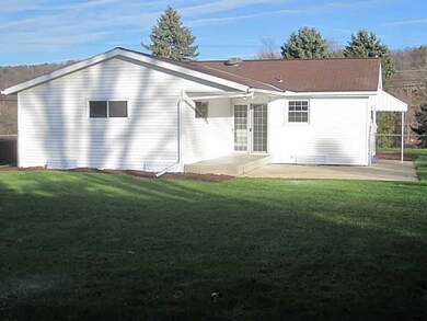 Exterior Back. Level fenced-in back yard
