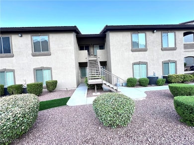 View of building exterior featuring stairway