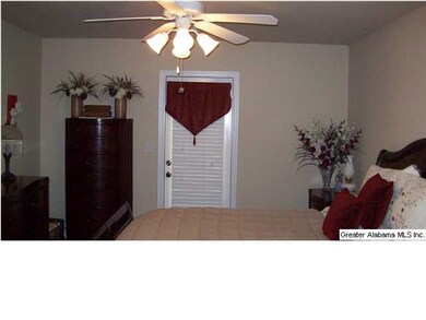The master bedroom is large and the neutral colori