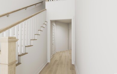 Stairs with hardwood / wood-style flooring