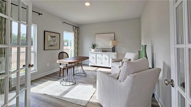 Images are of model home and may include custom design features not available in other homes. [Furnishings and decorative items are not included with home purchase.]