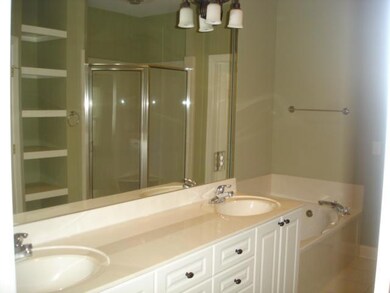 Tall Bathroom Double Vanity, Great Fixtures and Trim Package. Whirlpool Tub and Storage Area in Closet. 
