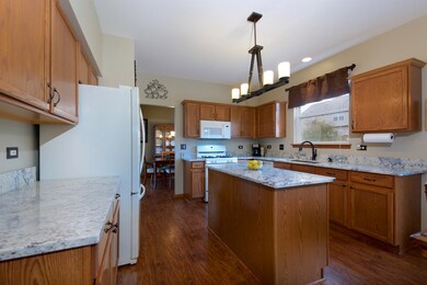 Kitchen with new granite throughout.  Big center I